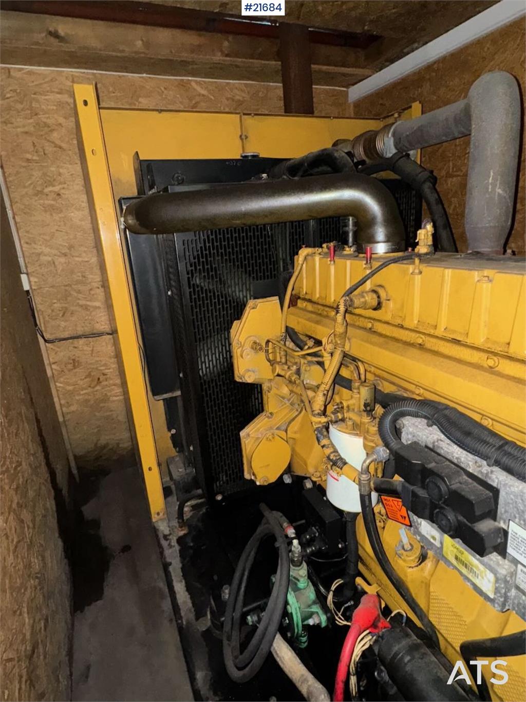 Olympian GEH250 generator with container