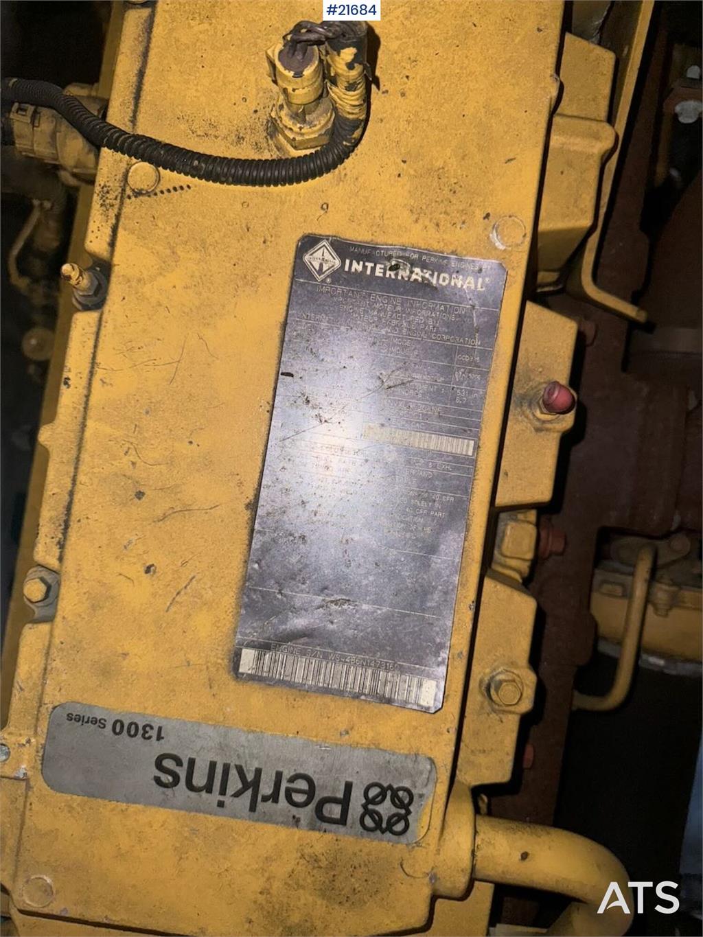 Olympian GEH250 generator with container