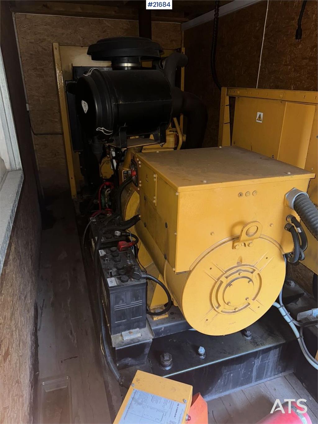 Olympian GEH250 generator with container