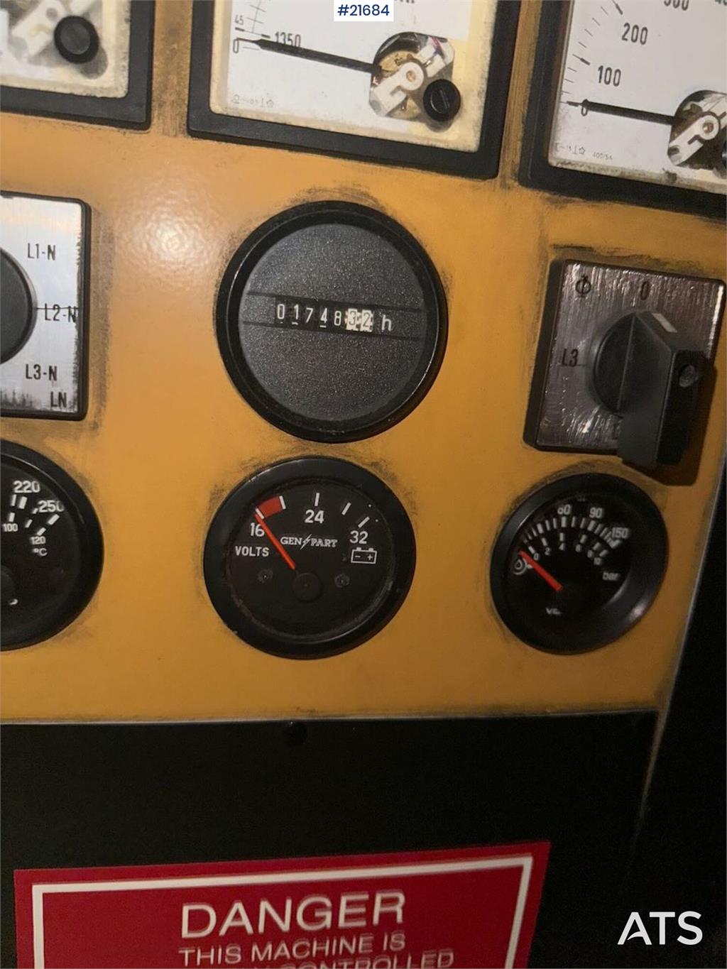 Olympian GEH250 generator with container