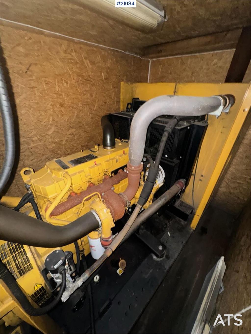 Olympian GEH250 generator with container