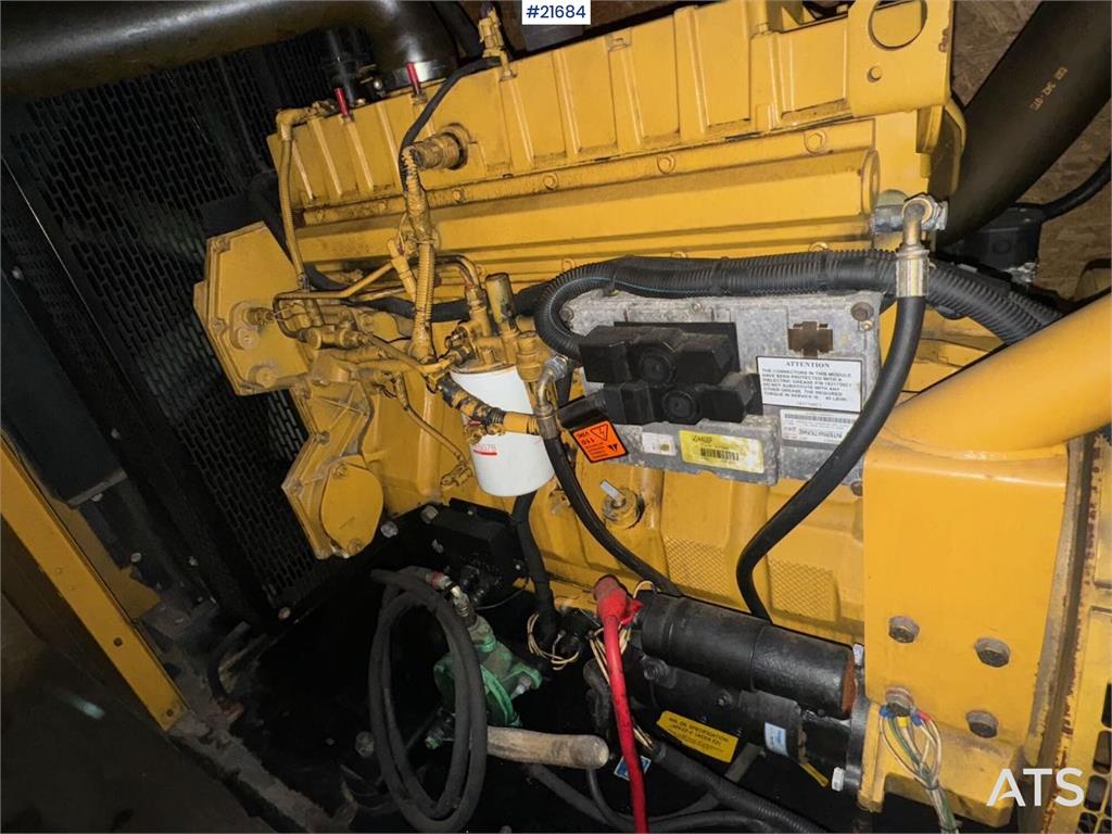 Olympian GEH250 generator with container