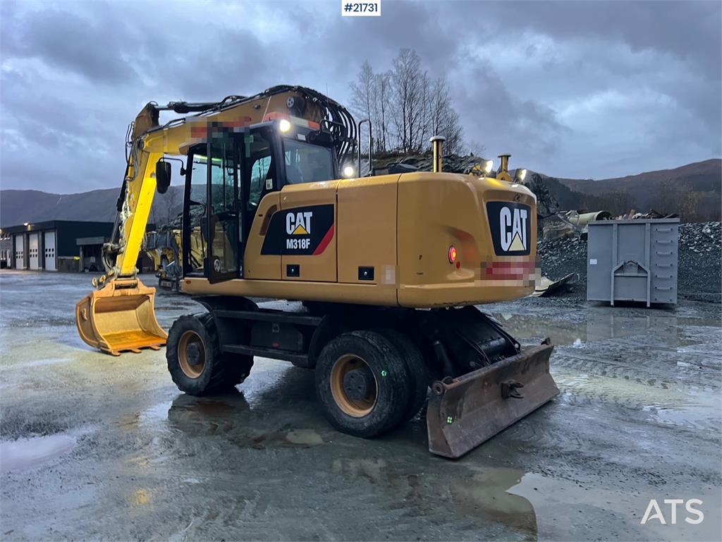 CAT M318F