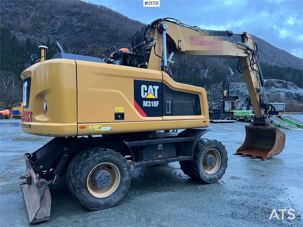 CAT M318F