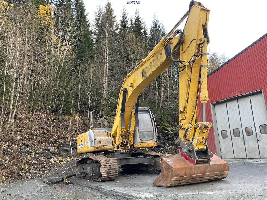 New Holland Kobelco E 265 with flap excavator bucket