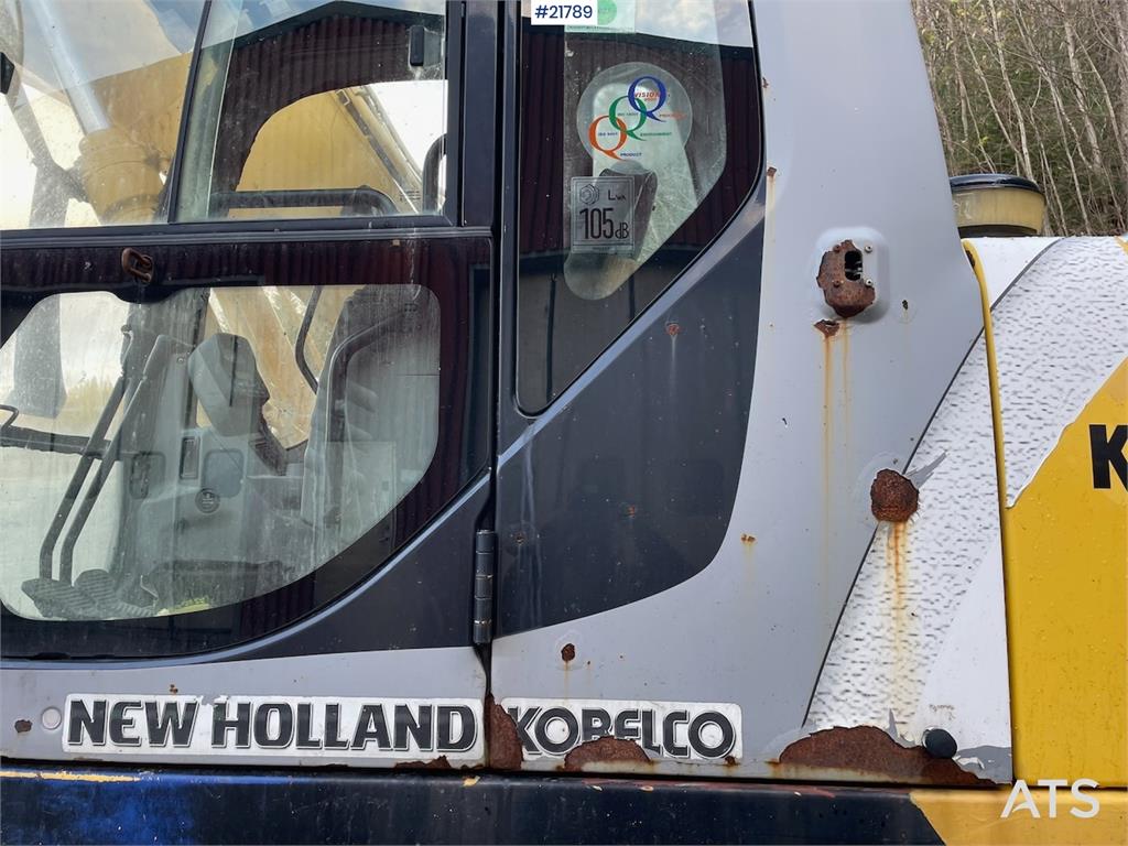 New Holland Kobelco E 265 with flap excavator bucket