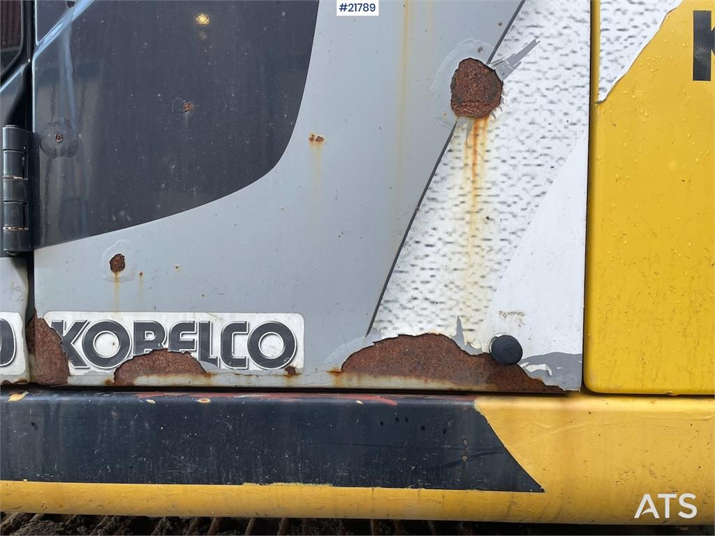 New Holland Kobelco E 265 with flap excavator bucket