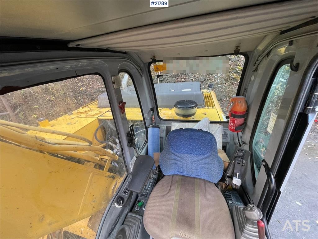 New Holland Kobelco E 265 with flap excavator bucket