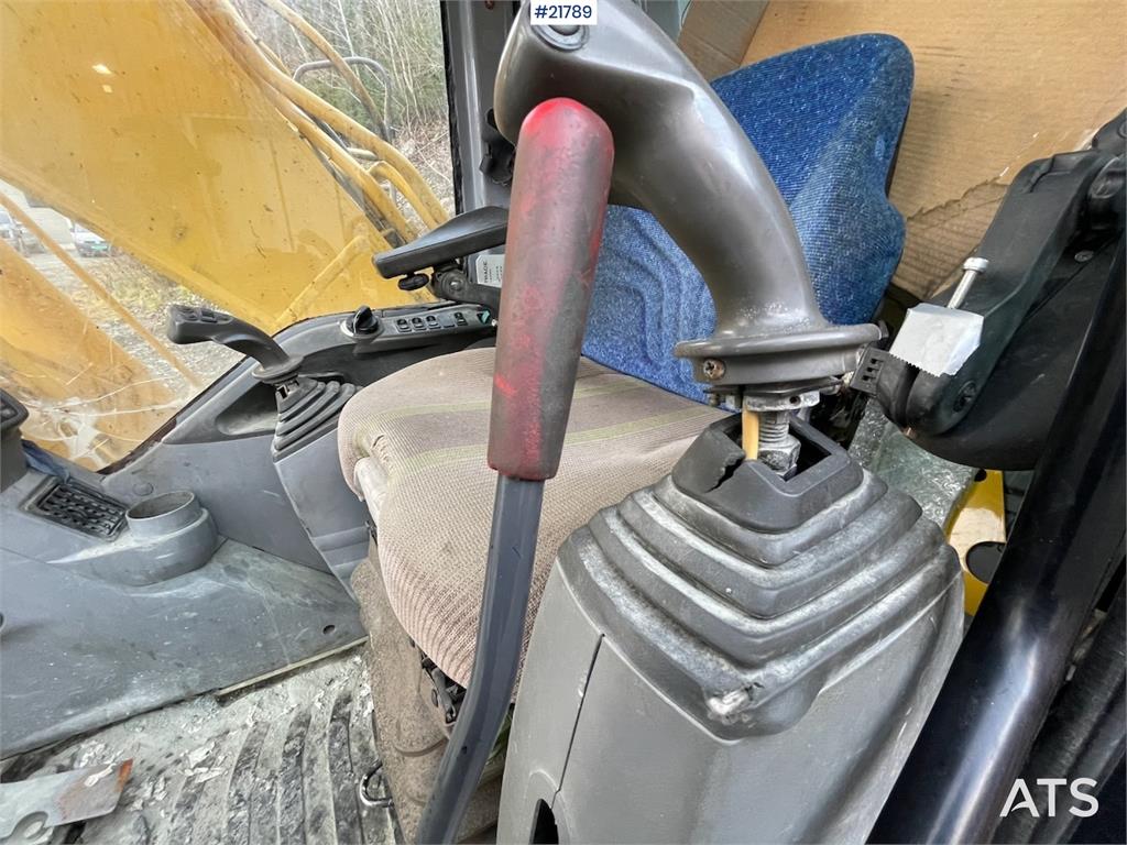 New Holland Kobelco E 265 with flap excavator bucket