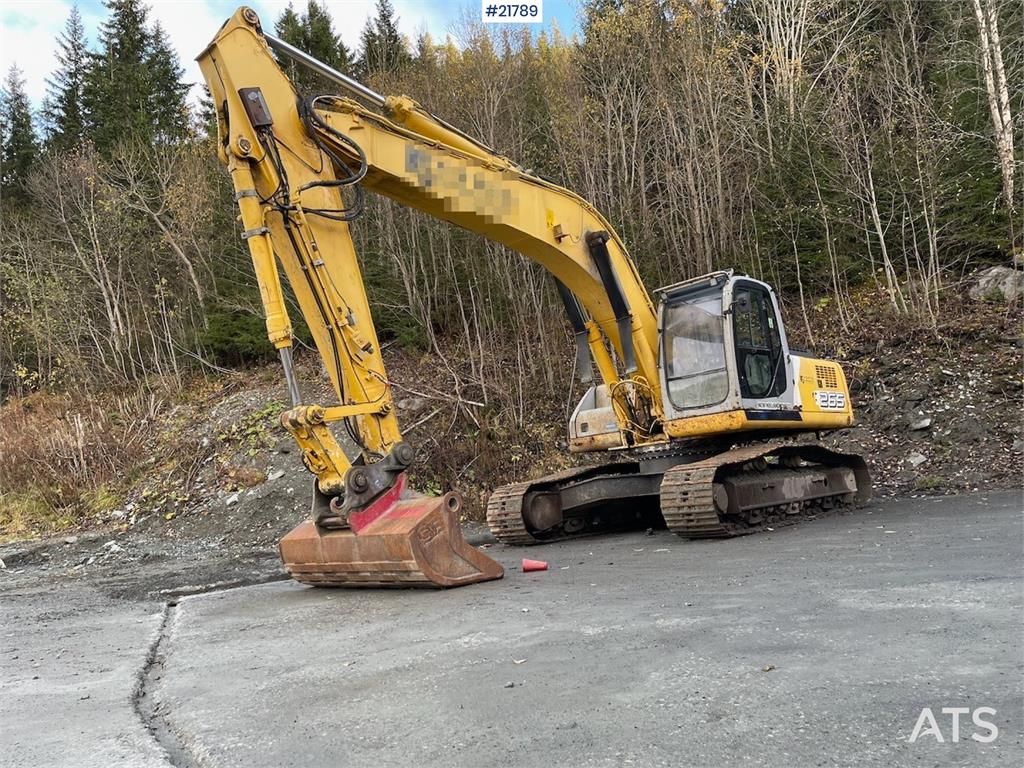 New Holland Kobelco E 265 with flap excavator bucket