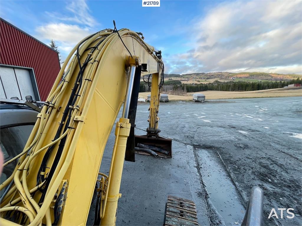 New Holland Kobelco E 265 with flap excavator bucket