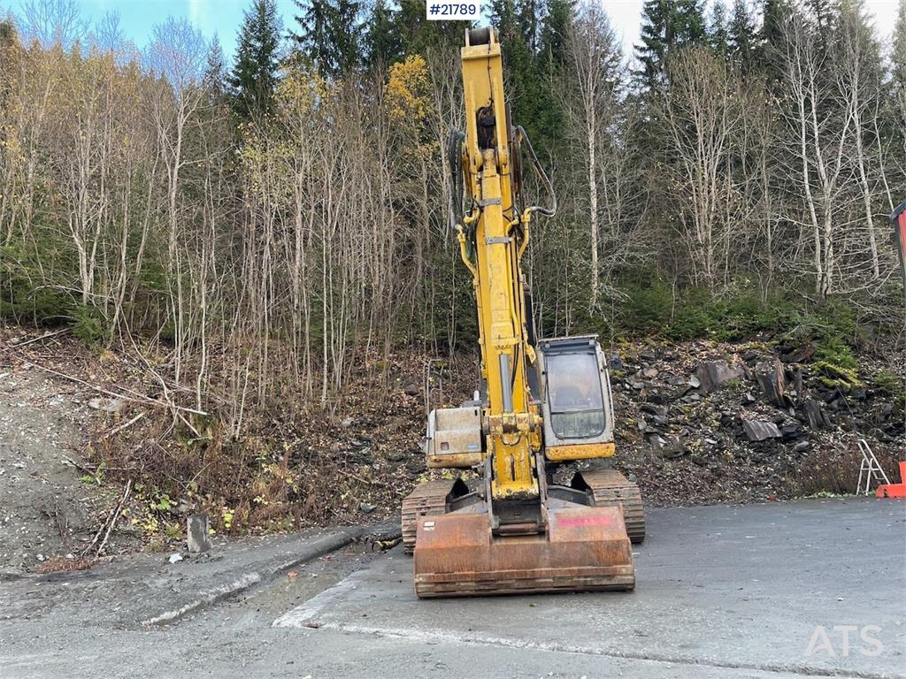 New Holland Kobelco E 265 with flap excavator bucket