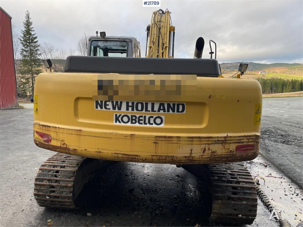 New Holland Kobelco E 265 with flap excavator bucket