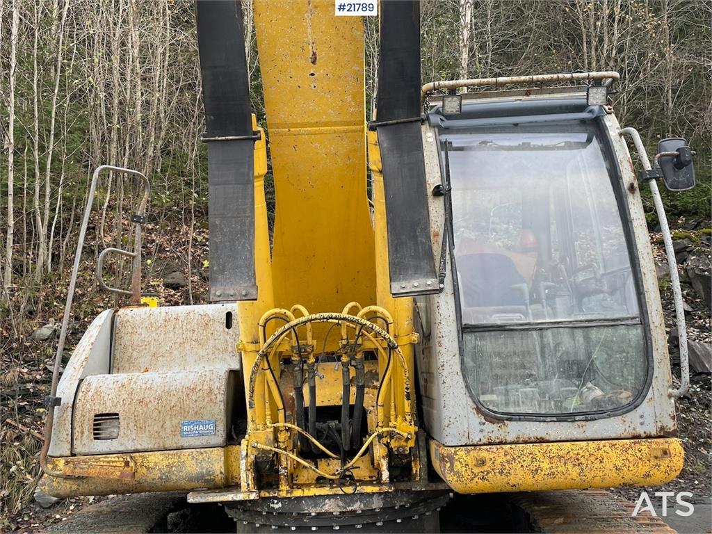 New Holland Kobelco E 265 with flap excavator bucket