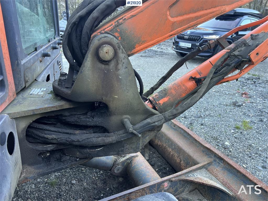 Doosan DX62R-3 excavator w/ rototilt, sanding bucket and
