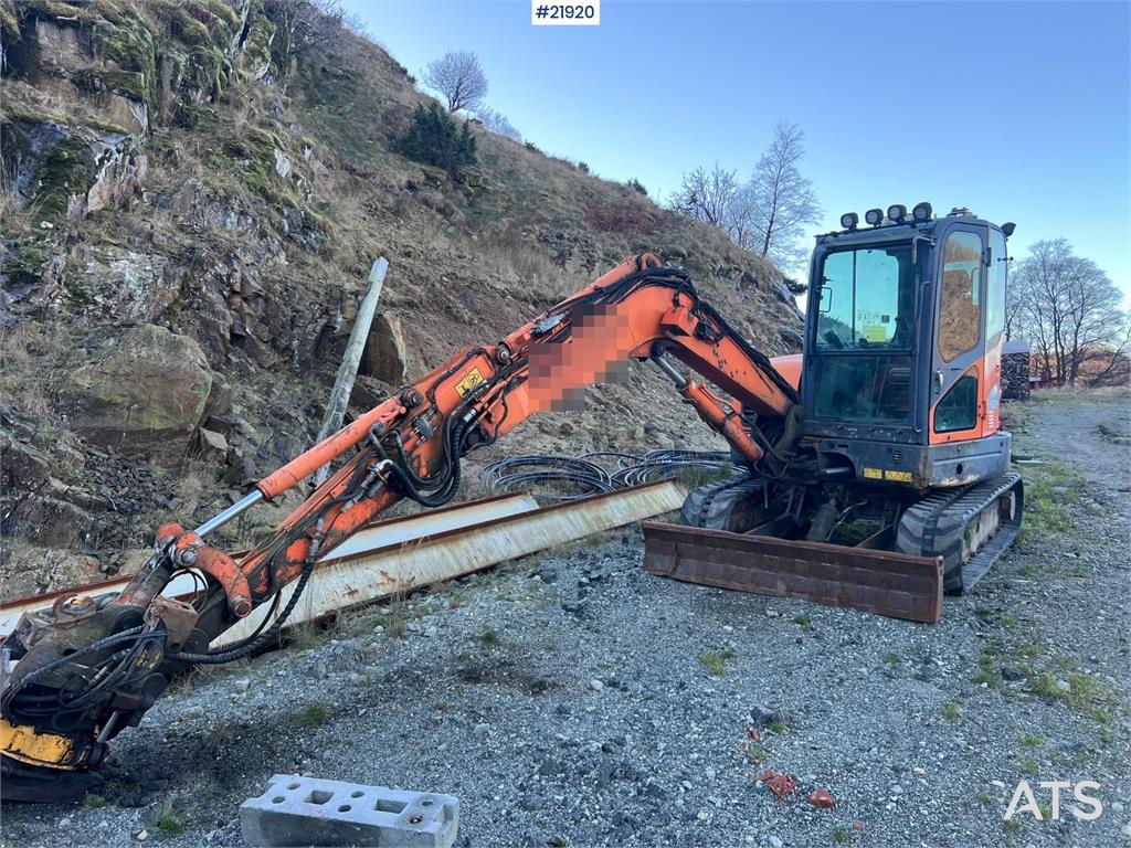 Doosan DX62R-3 excavator w/ rototilt, sanding bucket and