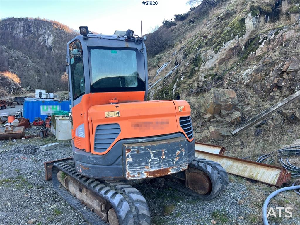 Doosan DX62R-3 excavator w/ rototilt, sanding bucket and
