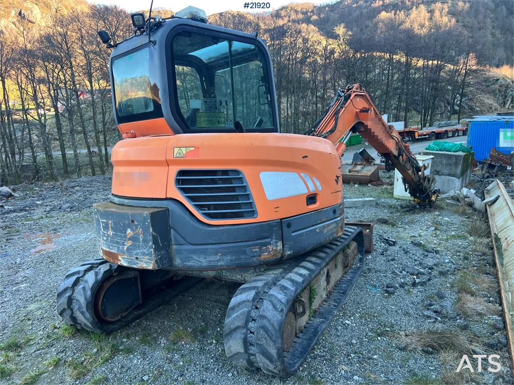 Doosan DX62R-3 excavator w/ rototilt, sanding bucket and