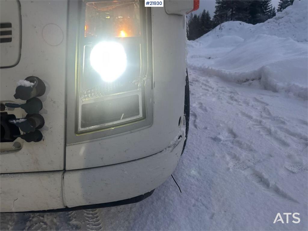 Volvo FH12 snow-plow equipped hook truck with flatbed –