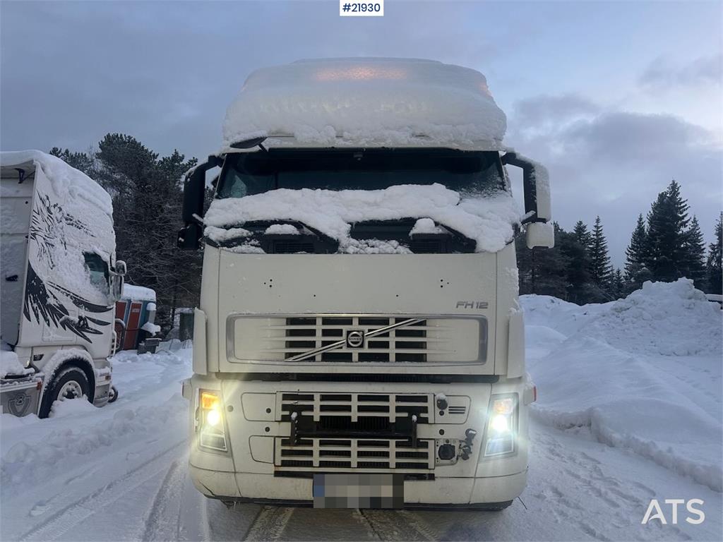 Volvo FH12 snow-plow equipped hook truck with flatbed –