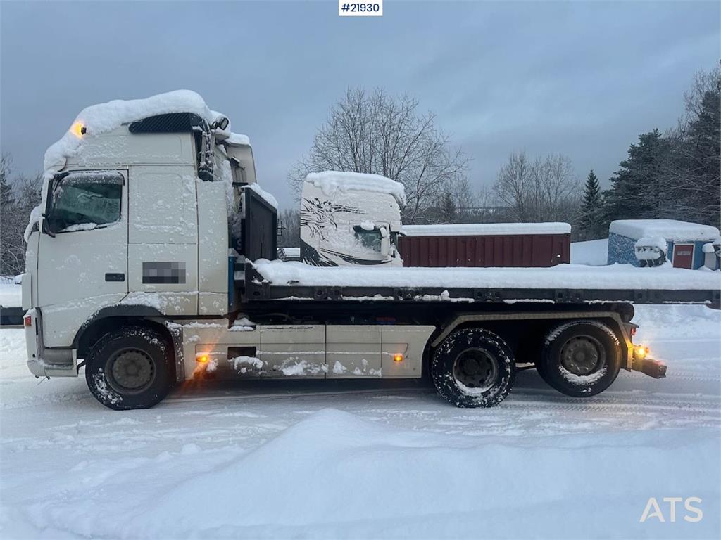 Volvo FH12 snow-plow equipped hook truck with flatbed –