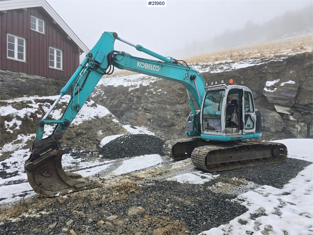 Kobelco SK135 SR LC tracked excavator with digging bucket