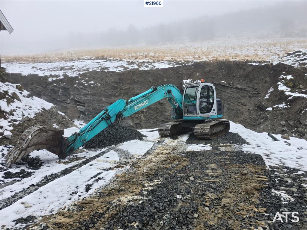 Kobelco SK135 SR LC tracked excavator with digging bucket