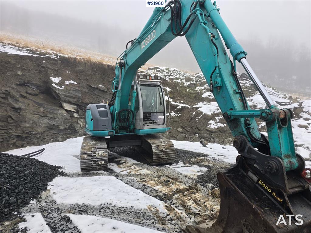 Kobelco SK135 SR LC tracked excavator with digging bucket