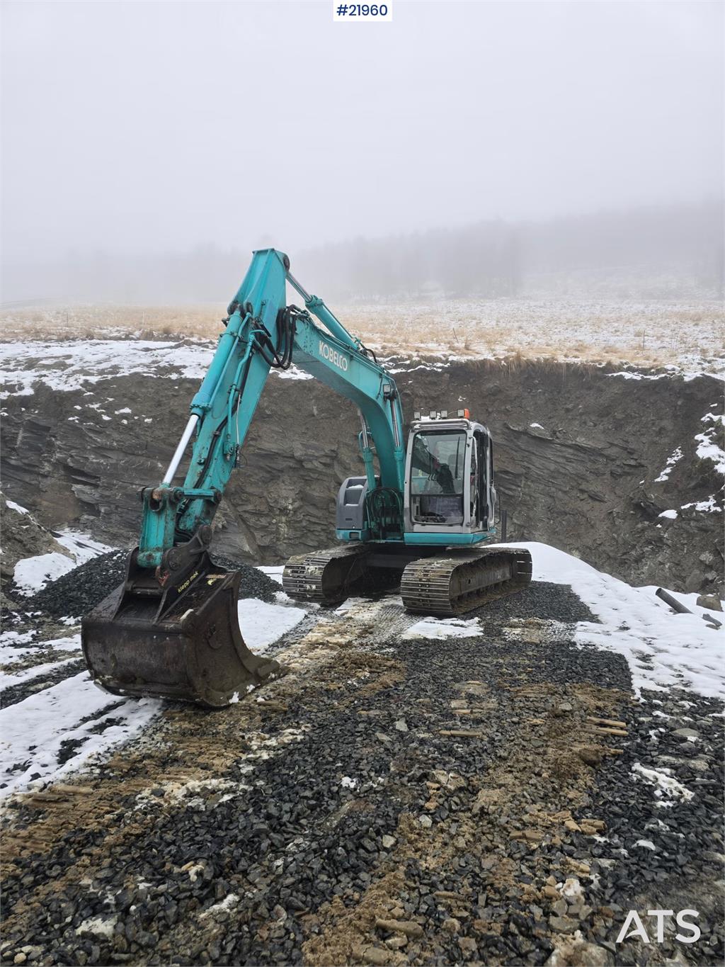 Kobelco SK135 SR LC tracked excavator with digging bucket