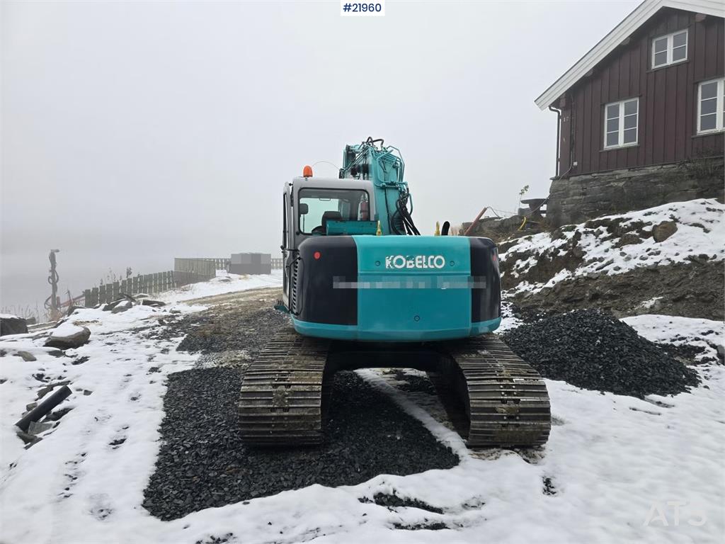 Kobelco SK135 SR LC tracked excavator with digging bucket