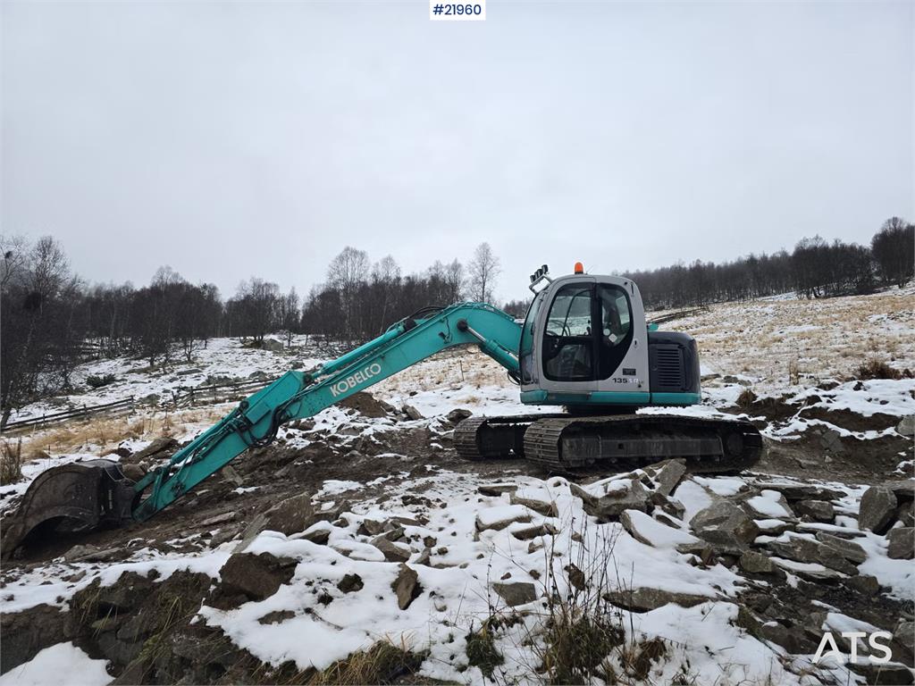Kobelco SK135 SR LC tracked excavator with digging bucket