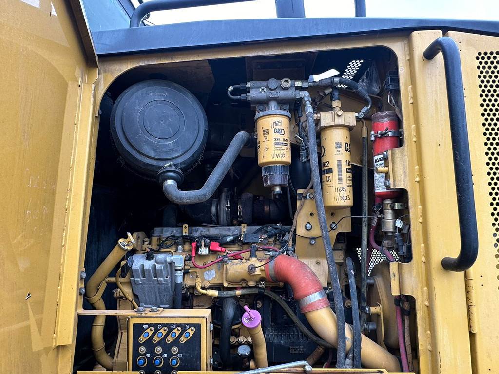 CAT 140M Ripper + Pushblock