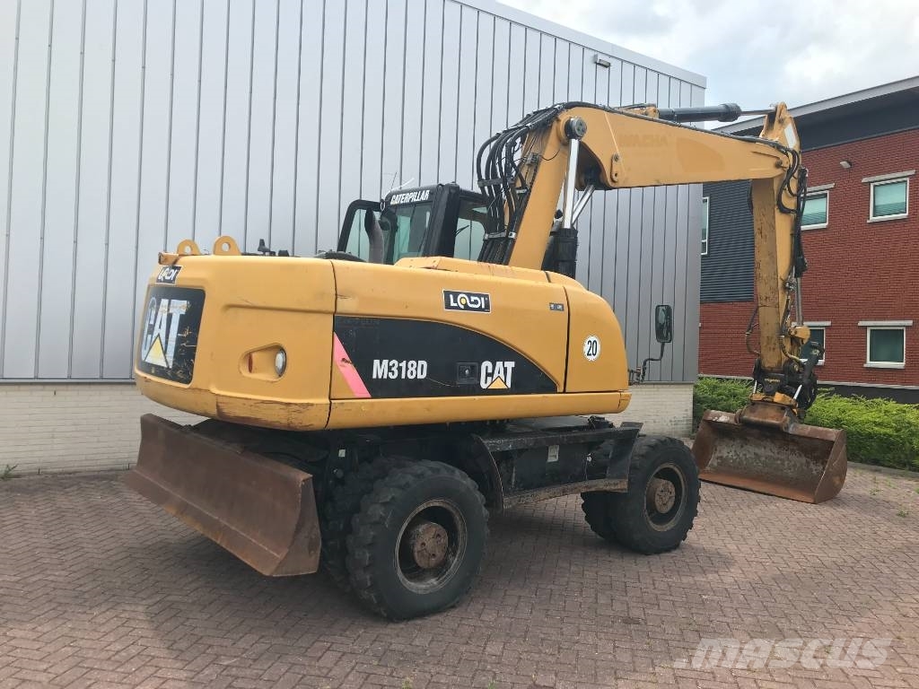 Caterpillar M 318 D, 2010, Netherlands Used wheeled excavators